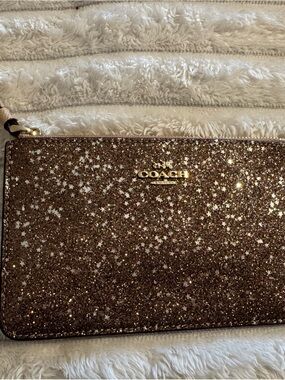COACH Rose Gold Glitter Star Wristlet